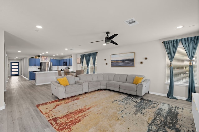10433 Russell Pines Dr, Rosharon, TX 77583 - living room with light wood-type flooring, recessed lighting, and a ceiling fan