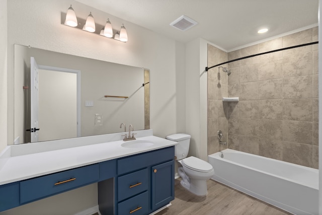 10433 Russell Pines Dr, Rosharon, TX 77583 - full bath featuring wood finished floors, vanity, and bathtub / shower combination