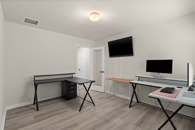 10433 Russell Pines Dr, Rosharon, TX 77583 - office area with wood finished floors and baseboards