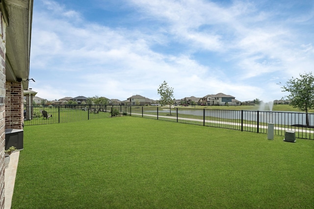 10433 Russell Pines Dr, Rosharon, TX 77583 - view of yard with a water view and a residential view