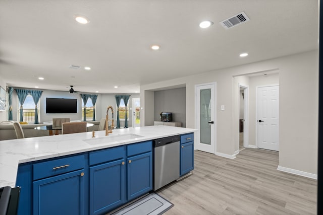 10433 Russell Pines Dr, Rosharon, TX 77583 - kitchen featuring dishwasher, open floor plan, plenty of natural light, light wood-type flooring, and recessed lighting