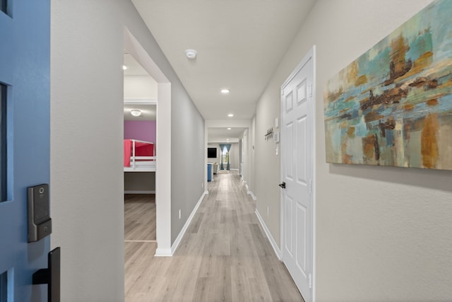 10433 Russell Pines Dr, Rosharon, TX 77583 - hall with light wood-style floors and recessed lighting