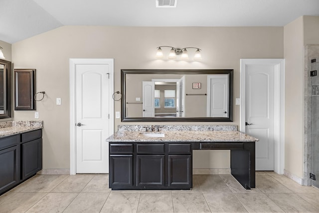 5622 Chipstone Trail Ln, Katy, TX 77493 - full bathroom featuring vanity, a stall shower, vaulted ceiling, and tile patterned floors