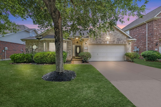 15215 Millers Run Ln, Sugar Land, TX 77498 - view of front of house with an attached garage, a yard, concrete driveway, and brick siding