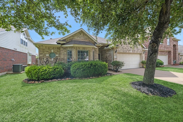 15215 Millers Run Ln, Sugar Land, TX 77498 - view of front of house with driveway, a front lawn, brick siding, an attached garage, and roof with shingles