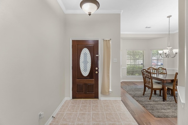 15215 Millers Run Ln, Sugar Land, TX 77498 - entrance foyer featuring a chandelier and ornamental molding
