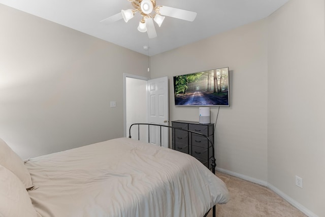 15215 Millers Run Ln, Sugar Land, TX 77498 - bedroom with light colored carpet and a ceiling fan