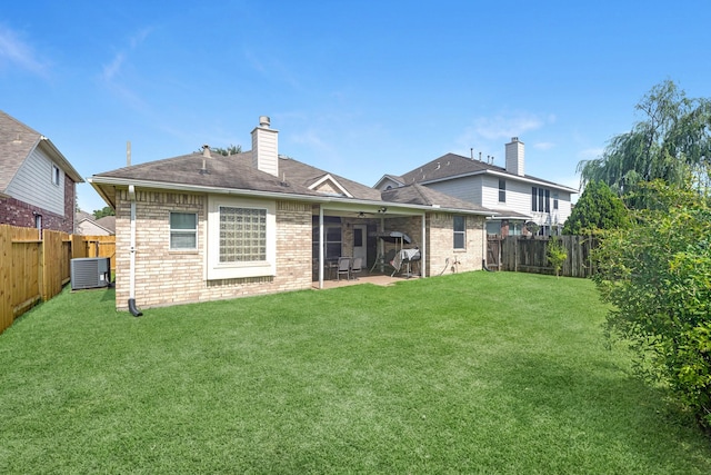 15215 Millers Run Ln, Sugar Land, TX 77498 - rear view of property featuring brick siding, a fenced backyard, a patio area, and a ceiling fan