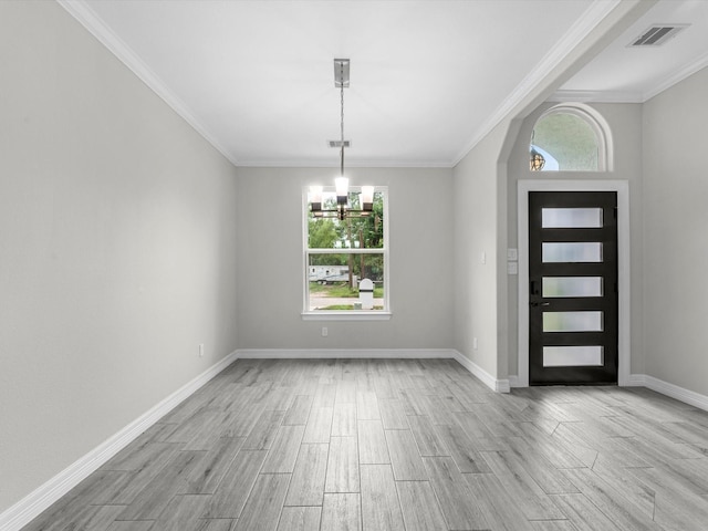 14606 Half Circle St, Splendora, TX 77372 - entryway with a chandelier, wood finished floors, and ornamental molding