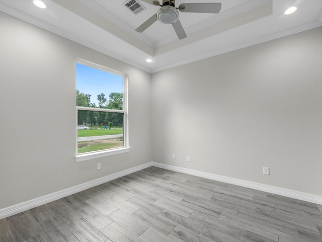 14606 Half Circle St, Splendora, TX 77372 - unfurnished room featuring crown molding, a ceiling fan, a raised ceiling, recessed lighting, and wood finished floors