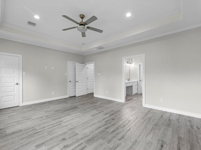 14606 Half Circle St, Splendora, TX 77372 - unfurnished room featuring a tray ceiling, ornamental molding, a ceiling fan, light wood-style floors, and recessed lighting