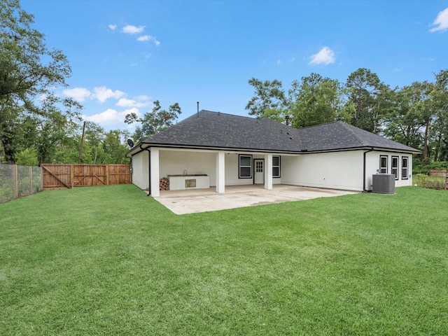 14606 Half Circle St, Splendora, TX 77372 - rear view of property with a patio area, roof with shingles, and stucco siding