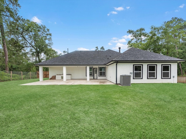 14606 Half Circle St, Splendora, TX 77372 - rear view of property featuring a patio, roof with shingles, and stucco siding