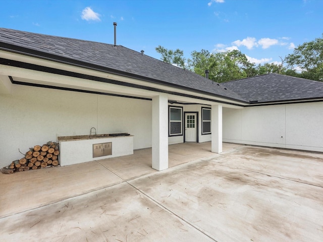 14606 Half Circle St, Splendora, TX 77372 - view of patio / terrace with an outdoor kitchen