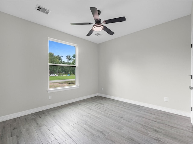 14606 Half Circle St, Splendora, TX 77372 - unfurnished room with wood finished floors and a ceiling fan