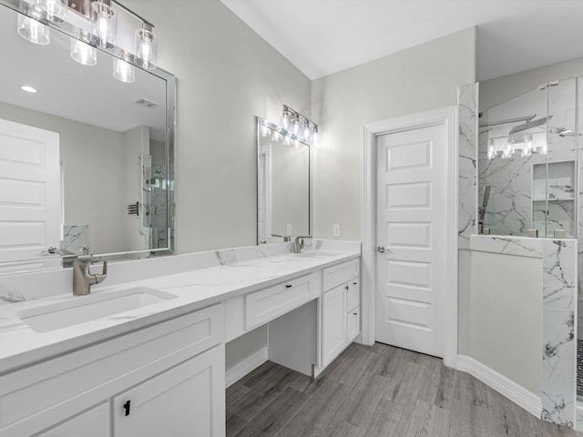 14606 Half Circle St, Splendora, TX 77372 - full bath featuring a marble finish shower, double vanity, wood finished floors, and recessed lighting