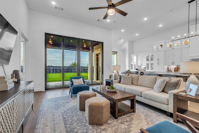 6826 Mirabeau Ln, Katy, TX 77493 - living room featuring a ceiling fan, wood finished floors, and recessed lighting