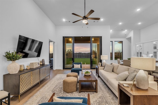 6826 Mirabeau Ln, Katy, TX 77493 - living area with ceiling fan, light wood-style floors, and recessed lighting