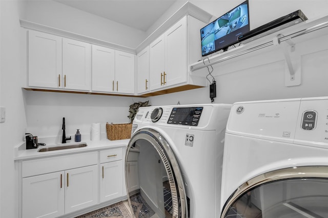 6826 Mirabeau Ln, Katy, TX 77493 - laundry room featuring washer and dryer and cabinet space