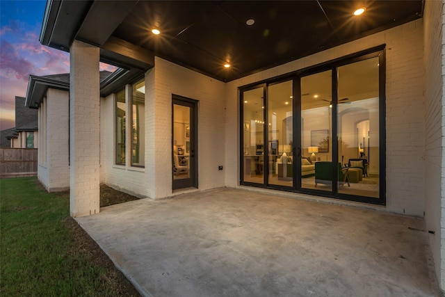 6826 Mirabeau Ln, Katy, TX 77493 - patio terrace at dusk featuring a patio area