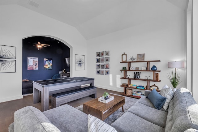 6826 Mirabeau Ln, Katy, TX 77493 - living room with vaulted ceiling, wood finished floors, a ceiling fan, and arched walkways