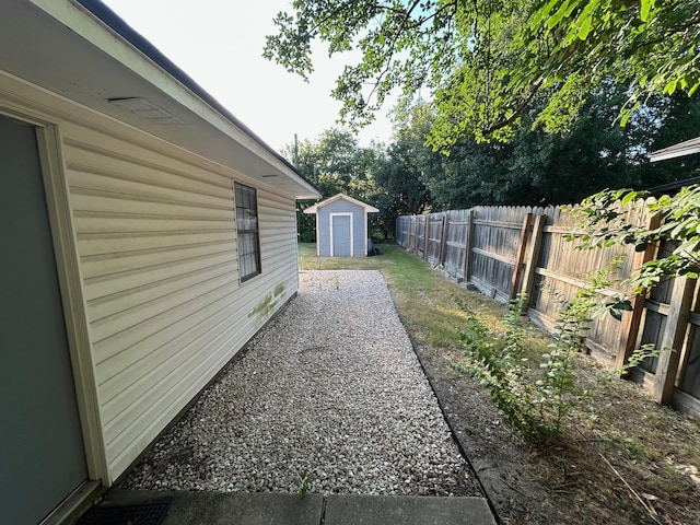 301 Park Pl, College Station, TX 77840 - view of yard with a storage shed