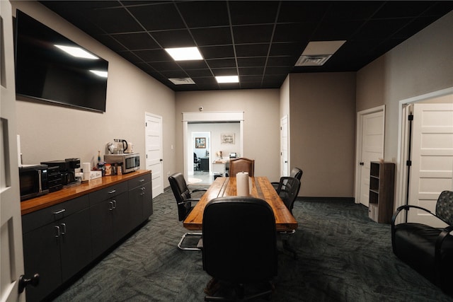 8432 Park Place Blvd, Houston, TX 77017 - home office featuring dark carpet and a drop ceiling