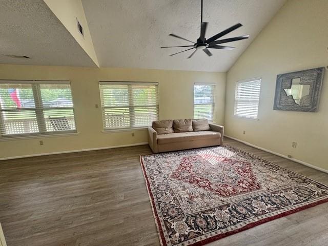 344 Timber Bay Dr, Trinity, TX 75862 - living area featuring ceiling fan, wood finished floors, a textured ceiling, and high vaulted ceiling