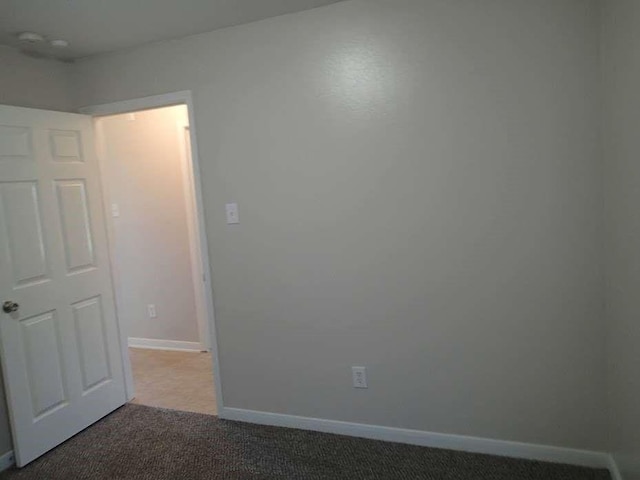 6906 Lost Timber Ln, Richmond, TX 77469 - empty room featuring carpet floors and baseboards