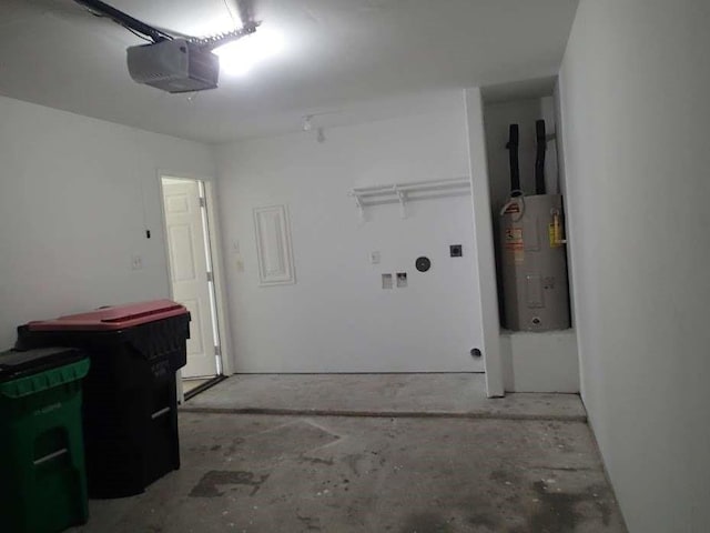 6906 Lost Timber Ln, Richmond, TX 77469 - garage with electric water heater and a garage door opener