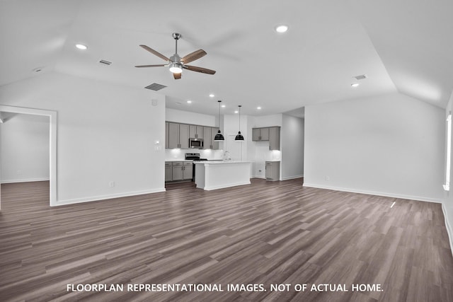 26112 Ethereal Rd, La Marque, TX 77563 - unfurnished living room with lofted ceiling, a ceiling fan, dark wood finished floors, and recessed lighting