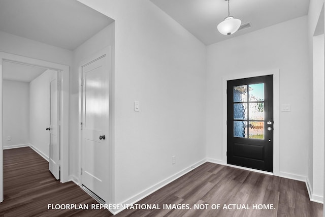 26112 Ethereal Rd, La Marque, TX 77563 - entrance foyer featuring dark wood-type flooring