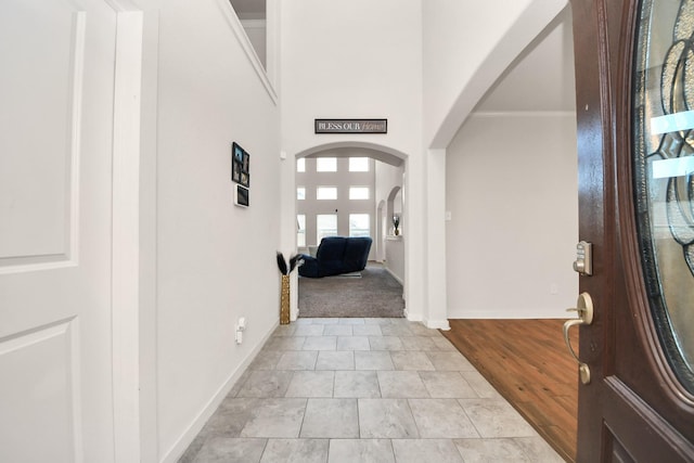 622 Aberhill Dr, Rosharon, TX 77583 - entryway featuring arched walkways and crown molding