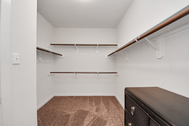 622 Aberhill Dr, Rosharon, TX 77583 - spacious closet featuring dark carpet