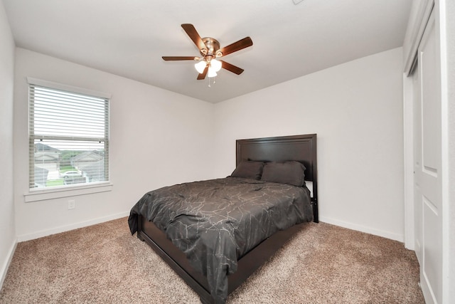 622 Aberhill Dr, Rosharon, TX 77583 - carpeted bedroom with a ceiling fan and a closet