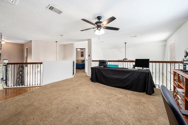 2227 Country Creek Way, Richmond, TX 77406 - living room with ceiling fan, carpet flooring, and a textured ceiling