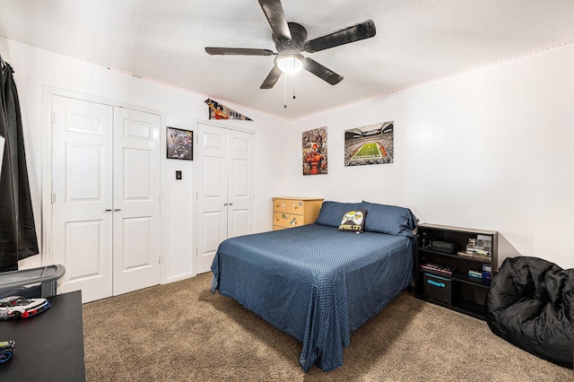 2227 Country Creek Way, Richmond, TX 77406 - carpeted bedroom with multiple closets and a ceiling fan