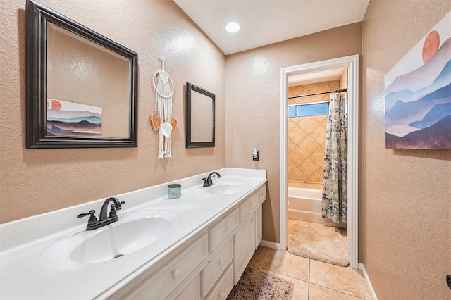 2227 Country Creek Way, Richmond, TX 77406 - bathroom with a textured wall, double vanity, tile patterned flooring, and shower / bath combination with curtain
