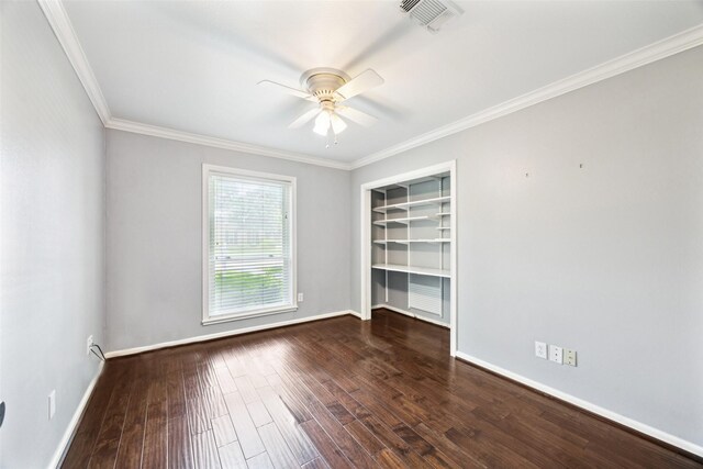 10610 Bordley Dr, Houston, TX 77042 - unfurnished room with ceiling fan, wood finished floors, ornamental molding, and built in shelves