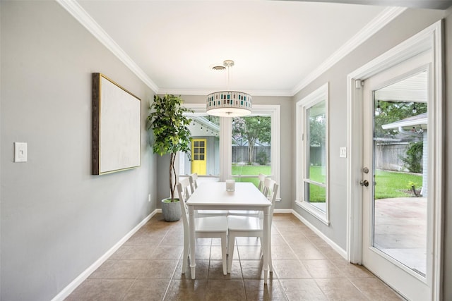 10610 Bordley Dr, Houston, TX 77042 - dining area with crown molding and light tile patterned floors