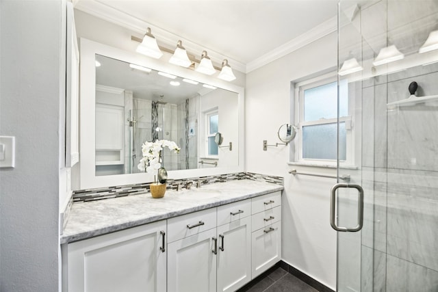 10610 Bordley Dr, Houston, TX 77042 - bathroom with vanity, a stall shower, ornamental molding, and tile patterned flooring