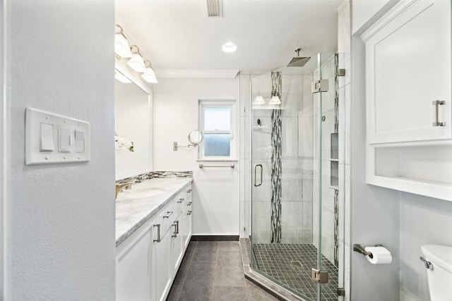 10610 Bordley Dr, Houston, TX 77042 - bathroom featuring vanity, a shower stall, tile patterned flooring, and ornamental molding