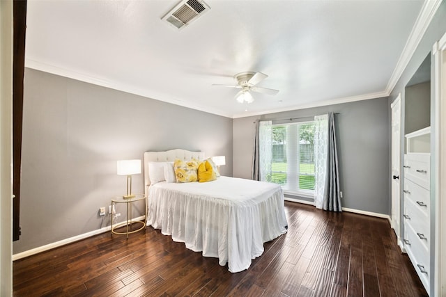 10610 Bordley Dr, Houston, TX 77042 - bedroom featuring dark wood-style flooring, a ceiling fan, and ornamental molding