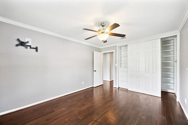 10610 Bordley Dr, Houston, TX 77042 - unfurnished bedroom with dark wood finished floors, ornamental molding, a closet, and ceiling fan