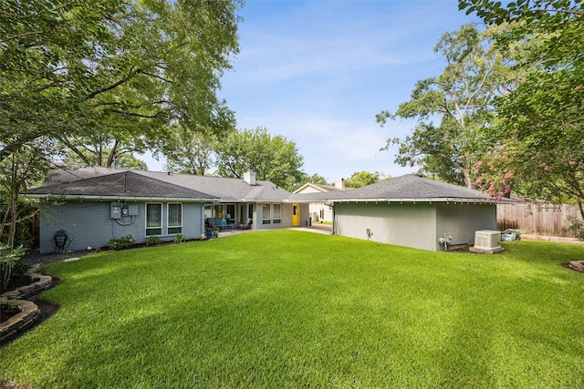 10610 Bordley Dr, Houston, TX 77042 - back of property with a chimney and brick siding
