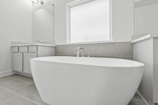 5029 Steady Breeze Dr, Katy, TX 77493 - full bath featuring a freestanding tub and vanity