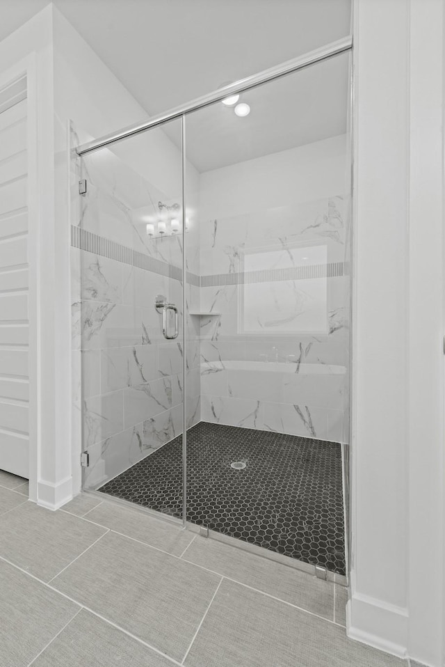 5029 Steady Breeze Dr, Katy, TX 77493 - bathroom featuring a marble finish shower
