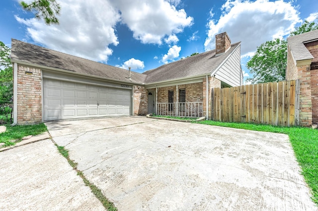 12710 Ashford Pine Dr, Houston, TX 77082 - single story home with brick siding, driveway, a garage, a chimney, and a shingled roof