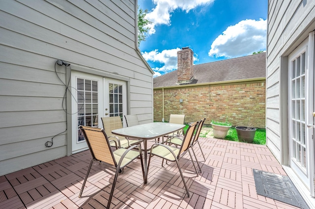 12710 Ashford Pine Dr, Houston, TX 77082 - deck with french doors, outdoor dining area, and a patio