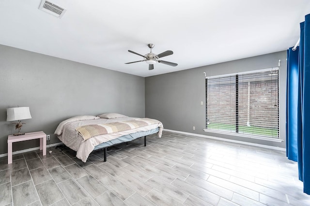 12710 Ashford Pine Dr, Houston, TX 77082 - bedroom featuring wood finished floors and a ceiling fan